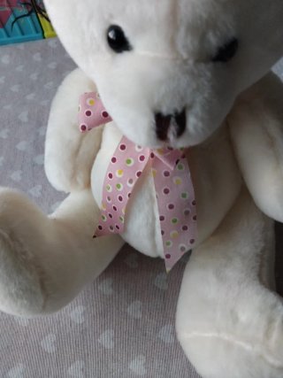 Peluche coniglio bianco con fiocco