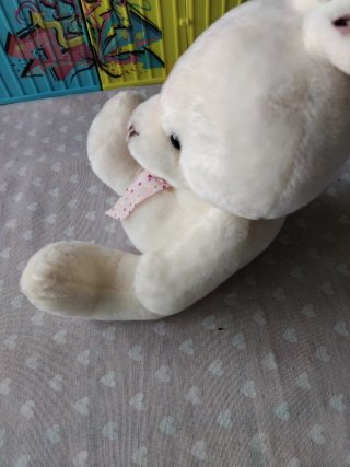 Peluche coniglio bianco con fiocco