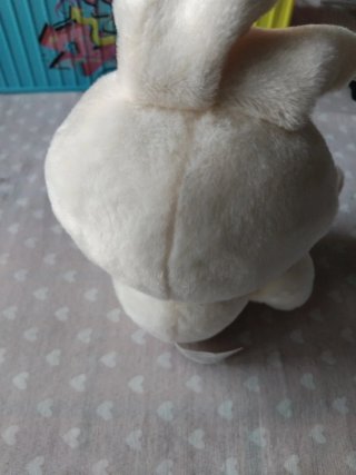 Peluche coniglio bianco con fiocco