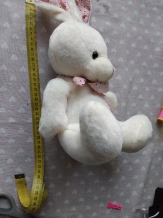 Peluche coniglio bianco con fiocco