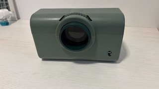 Proyector móvil verde