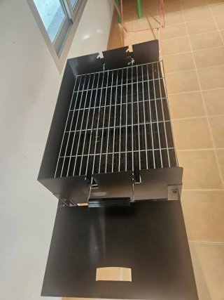 Barbacoa de carbón portátil negra