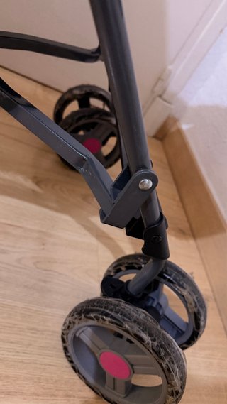 Silla de paseo rosa plegable