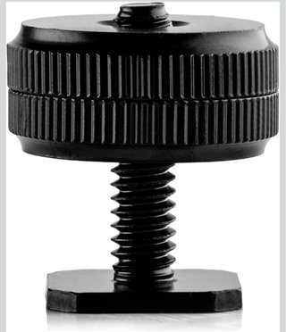 Adaptador de Zapata flash y cámara DSLR.