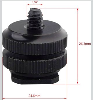Adaptador de Zapata flash y cámara DSLR.