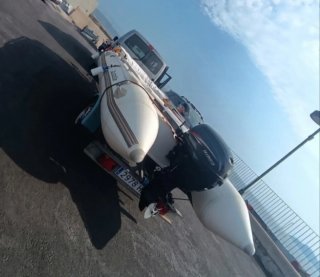 Barca Protender , motor y remolque. Lista traspaso