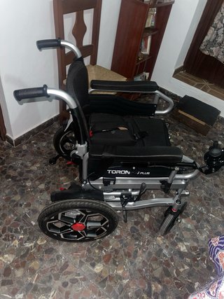 Silla de ruedas electrica con muy poco uso