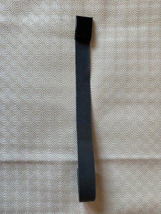 Cinturón de tela con hebilla metálica