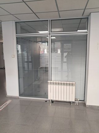 Cabina de oficina acristalada