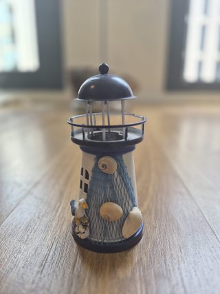 Decoración náutica: caballito de mar, faro, barco