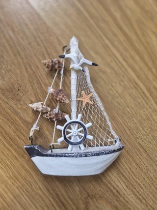 Decoración náutica: caballito de mar, faro, barco