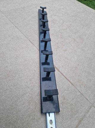 Colgador de pantalones para armario