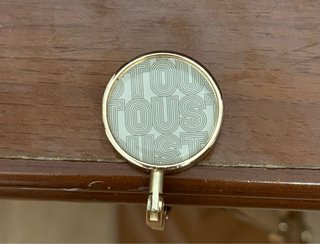 Colgador de bolsos Tous