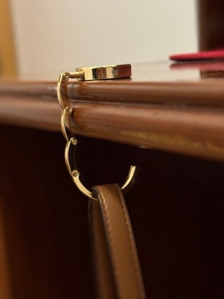 Colgador de bolsos Tous