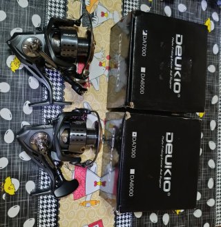 Pareja carretes de pesca spinning