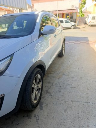 Kia Sportage  2013 165000 siempre garage no fumado