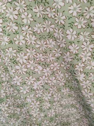 Vestito verde con fiorellini