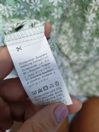 Vestito verde con fiorellini