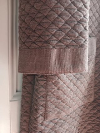 Cappotto trapuntato con bottoni dorati