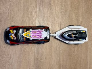 Coche de juguete Hot Sports con tabla de surf