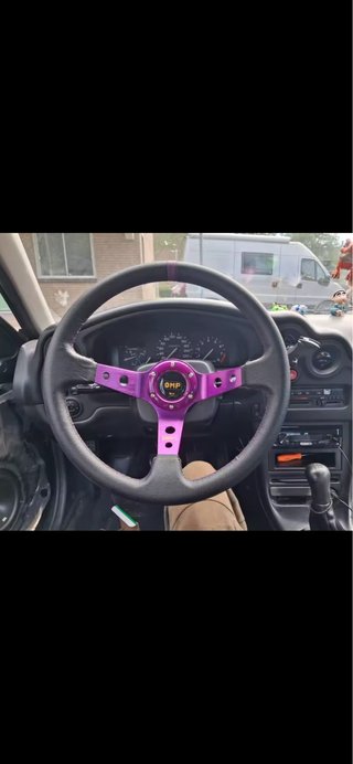 Volante OMP Morado Desplazado