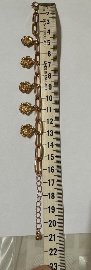 Bracciale vintage con margherite pendenti oro