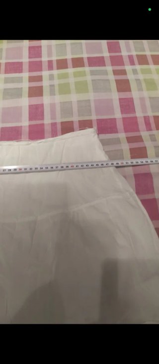 Falda blanca semilarga de volantes