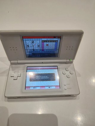 Nintendo DS Blanca con 7 juegos