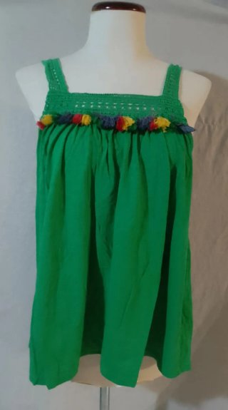 Jersey verde con adornos de pompones
