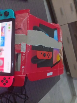 Nintendo Switch OLED Roja/Azul