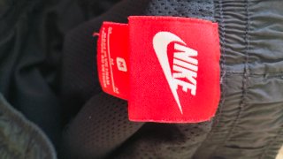 Pantalón chándal Nike vintage negro y verde