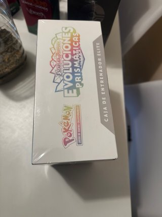 Caja Entrenador Elite Prismatic Evolutions Español
