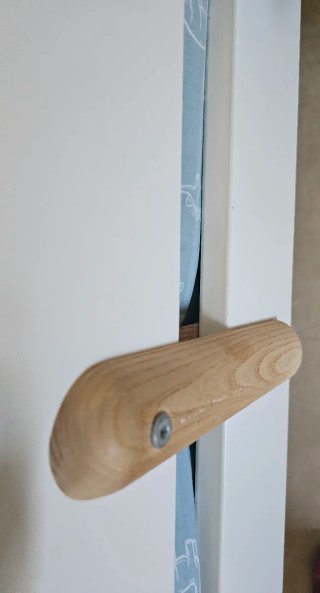 Barrera de cama de madera Flexa