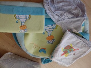 Bolsa, cambiador y saco de bebé con jirafas