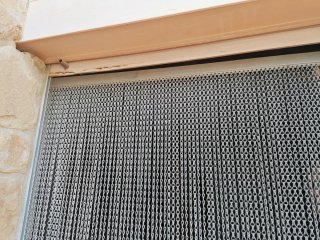 Cortina de acero inoxidable para puerta
