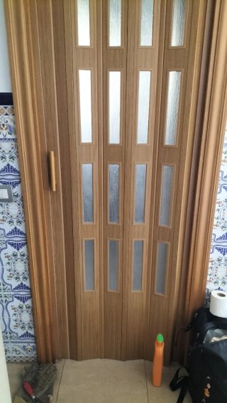 Puerta plegable corredera