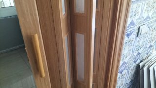 Puerta plegable corredera