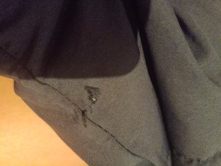 Abrigo acolchado negro con capucha