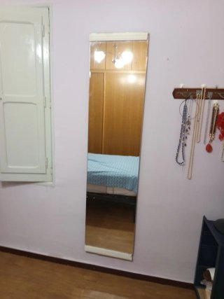Specchio a figura intera in legno e vetro