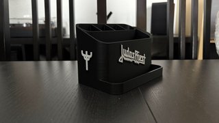 Supporto per plettri con accessori per chitarristi