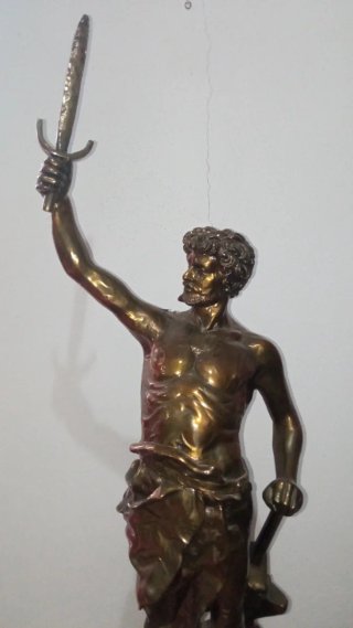 Figura de herrero romano