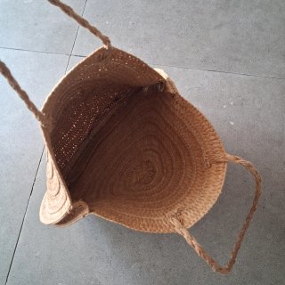 Bolso redondo de paja