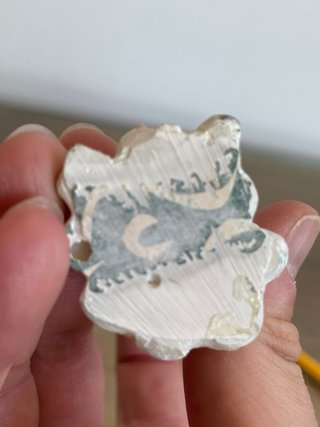 Pequeña figura ángel con flores plata