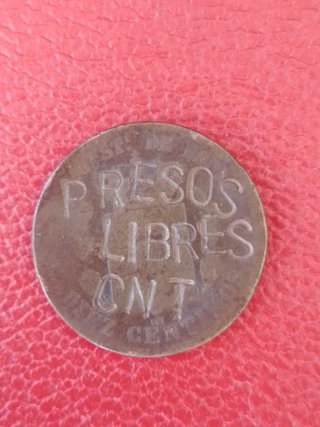 Antigua moneda con contramarca