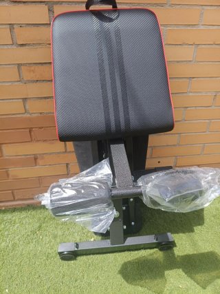 Banco de entrenamiento pesas ajustable y plegable.