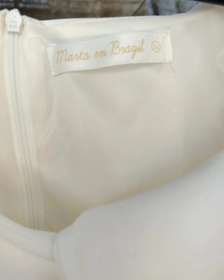 Traje de fiesta blanco con flecos