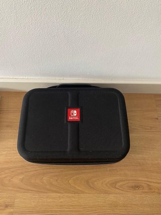 Nintendo Switch OLED azul i roja + Accesorios
