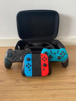 Nintendo Switch OLED azul i roja + Accesorios