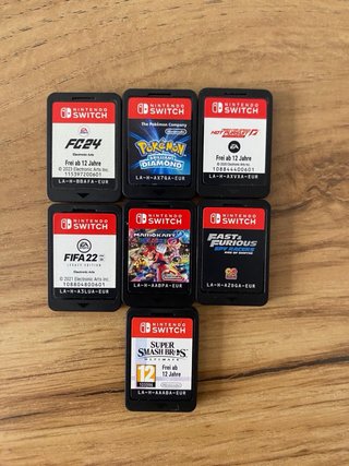 Nintendo Switch OLED azul i roja + Accesorios
