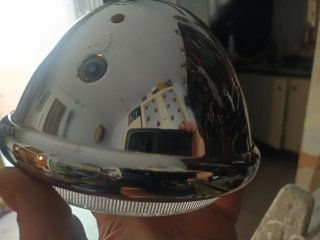 Faro de moto cromado